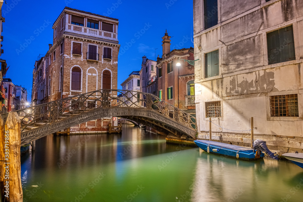 One of the famous canals of Venice in Italy at night