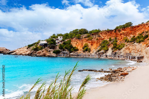 Cala d Hort Ibiza beach with traditional wood mooring photo