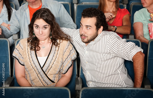 Guy Flirting in Theater photo