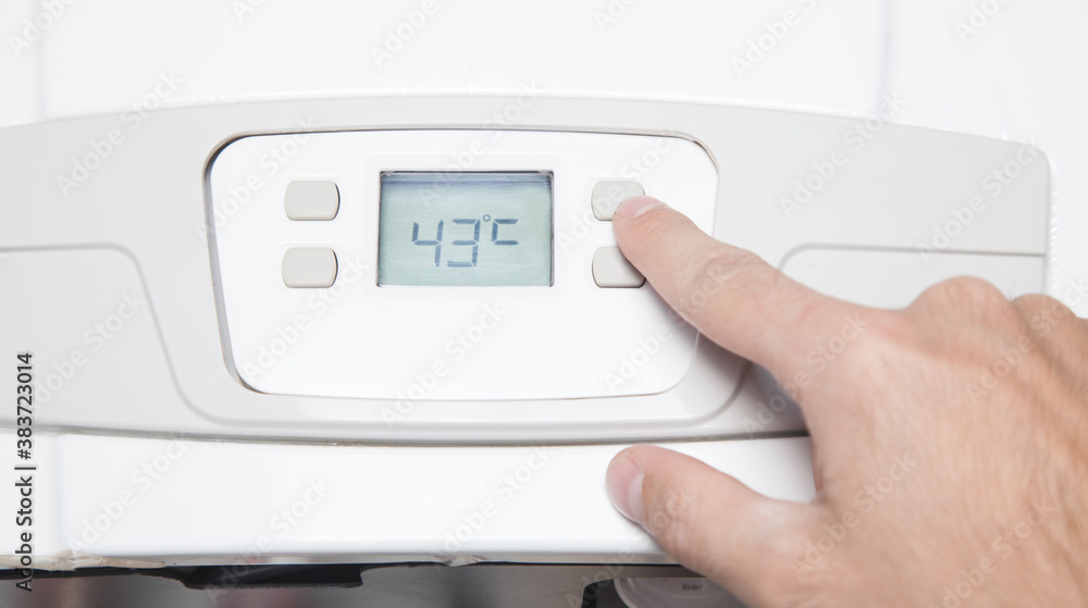 Hand adjusting room temperature. Apartment Hand adjusting room temperature. Apartment