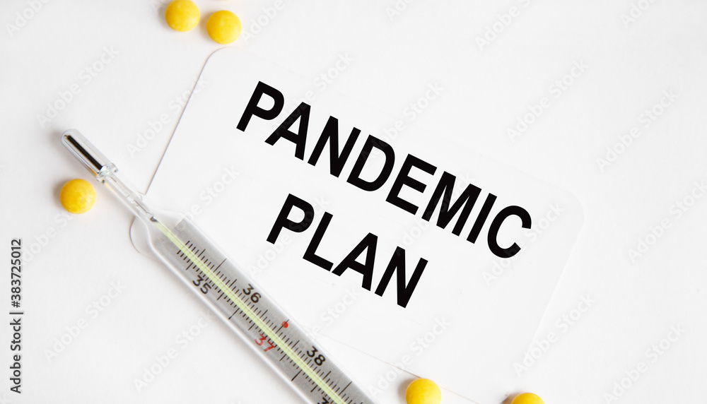 Obraz premium On the card the text of PANDEMIC PLAN, Yarmdo thermometer and yellow tablets.