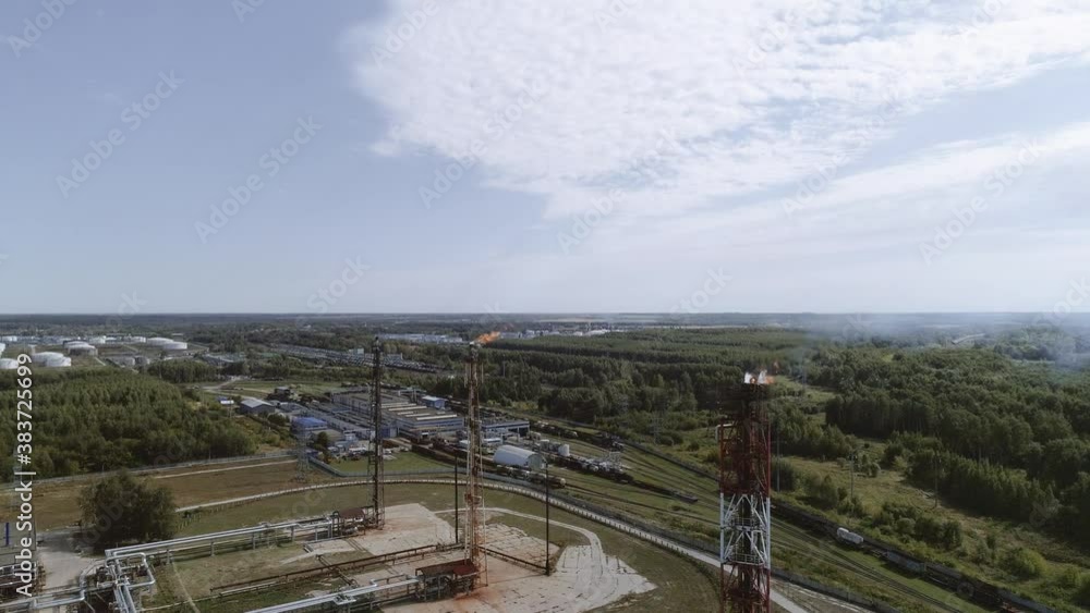 Large oil refinery aerial view. Lots of sophisticated technological equipment. Large oil refinery aerial view. Lots of sophisticated technological equipment.