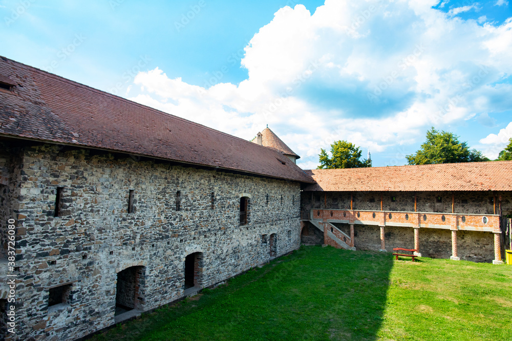 medieval fortress with brick walls and ramparts