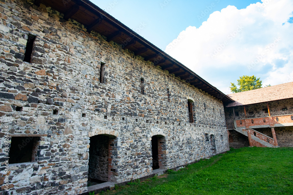 medieval fortress with brick walls and ramparts medieval fortress with brick walls and ramparts