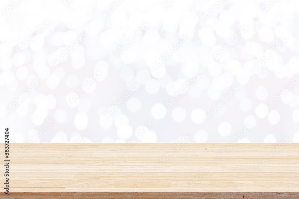 Naklejka premium Wood table top on white bokeh abstract background.