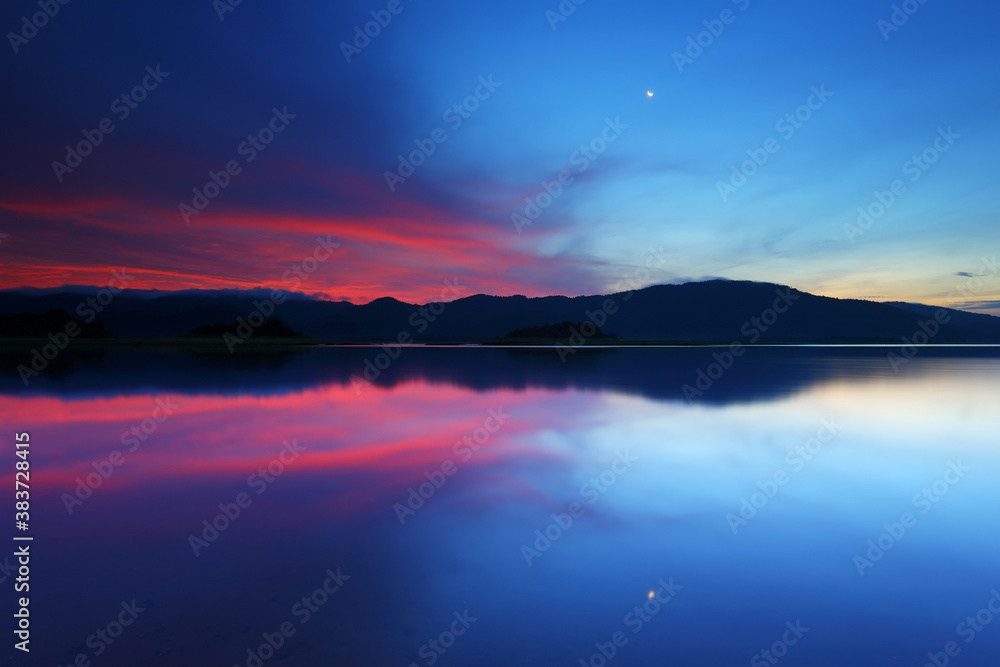 Sunrise over in water reservoir, Eastern Thailand


