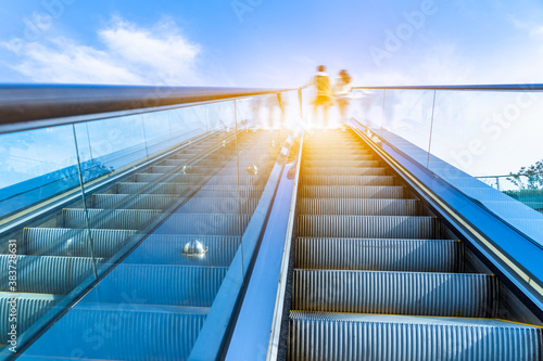 The escalator in the outdoor, urban abstract landscape