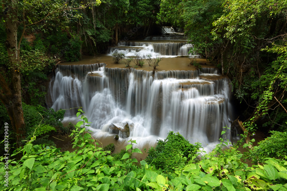 Landscape of Huai Mae Kamin waterfall Srinakarin at Kanchanaburi, Thailand. Travel trip on holiday and vacation background, tourist attraction. Landscape of Huai Mae Kamin waterfall Srinakarin at Kanchanaburi, Thailand. Travel trip on holiday and vacation background, tourist attraction.