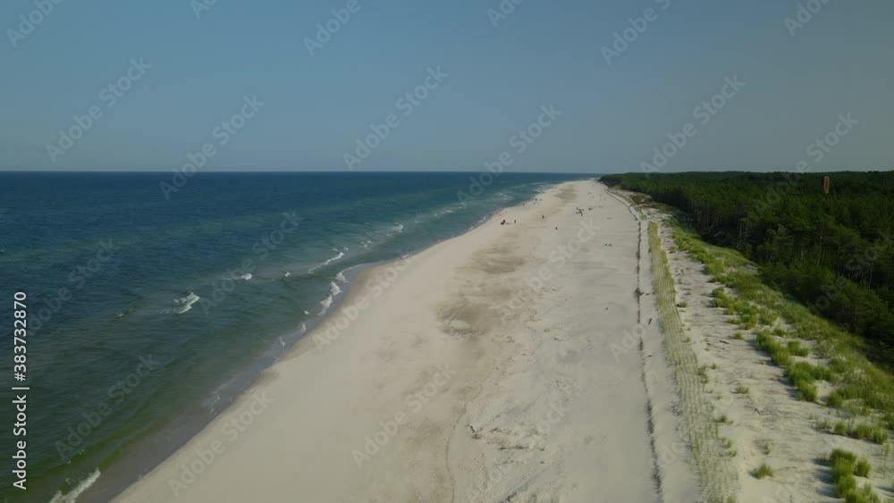 The Beautiful and Famous Osetnik Beach In Poland Composed Of White Sand and Bright Blue Waters - Aerial Shot The Beautiful and Famous Osetnik Beach In Poland Composed Of White Sand and Bright Blue Waters - Aerial Shot