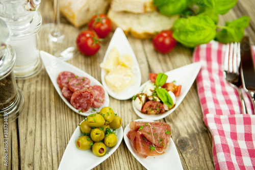 deliscious antipasti plate with parma parmesan olives  photo