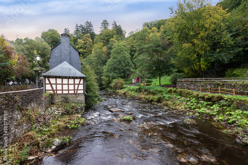 Rur river along the city park of the historic old town in Monschau, Germany. photo