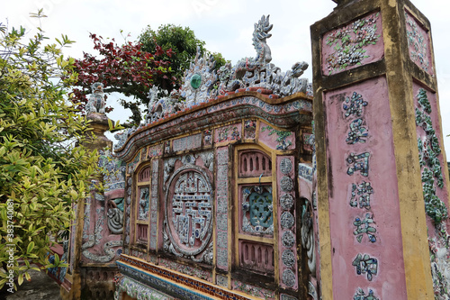 Hoi An, Vietnam, February 21, 2020: Wall at Chùa Phước Lâm temple. Hoi An, Vietnam