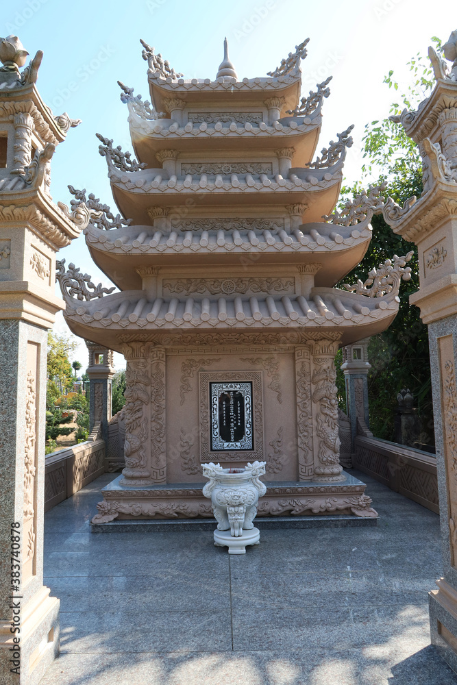 Hoi An, Vietnam, February 23, 2020: Pagoda at the entrance to the cemetery of the Chùa Phước Lâm temple. Hoi An, Vietnam