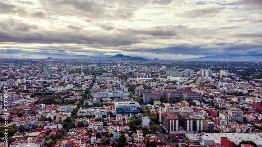 Flying backward over Benito Juarez in Mexico City, Aerial Cloud Hyperlapse Flying backward over Benito Juarez in Mexico City, Aerial Cloud Hyperlapse