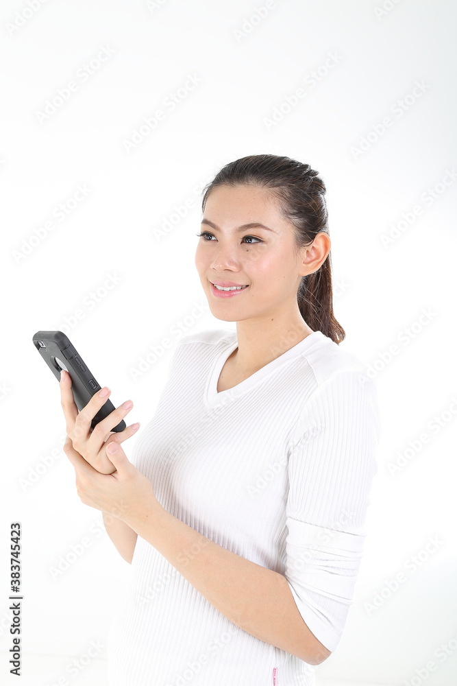 beautiful young south east Asian Chinese holding phone thinking wondering on white background beautiful young south east Asian Chinese holding phone thinking wondering on white background