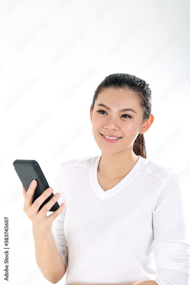 beautiful young south east Asian Chinese holding phone thinking wondering on white background beautiful young south east Asian Chinese holding phone thinking wondering on white background