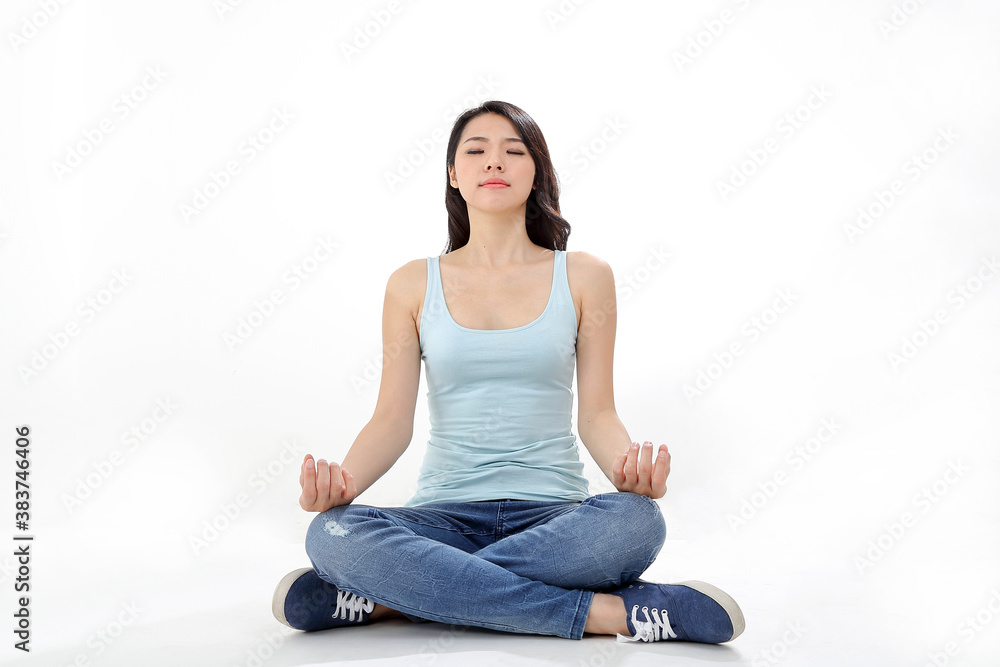 Beautiful young south east Asian Chinese woman yoga workout exercise on white background Beautiful young south east Asian Chinese woman yoga workout exercise on white background