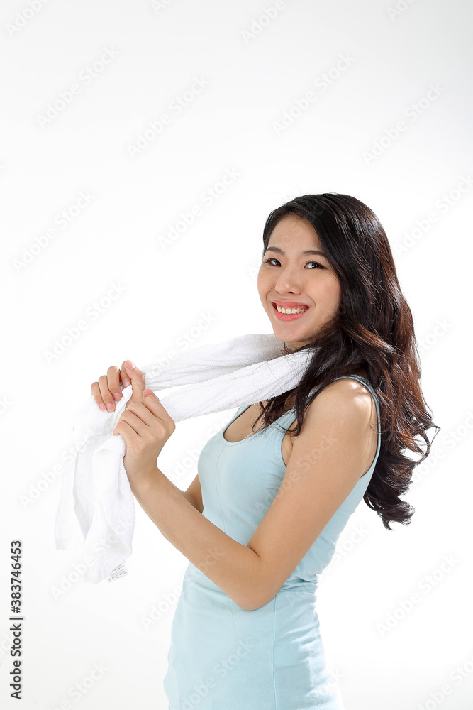 Beautiful young south east Asian Chinese woman workout exercise sweat towel on white background Beautiful young south east Asian Chinese woman workout exercise sweat towel on white background