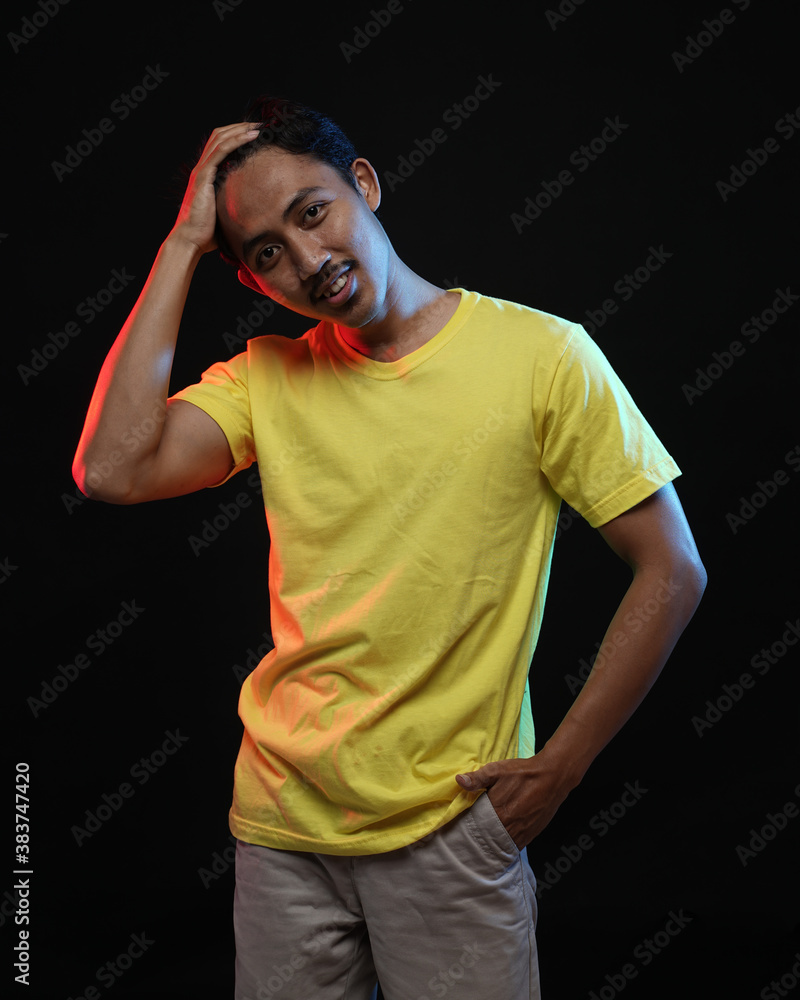 Young men in empty yellow T-shirts, stylish and posing like famous T-shirt  models. Men's t-shirt template and mockup design for print. Stock Photo |  Adobe Stock
