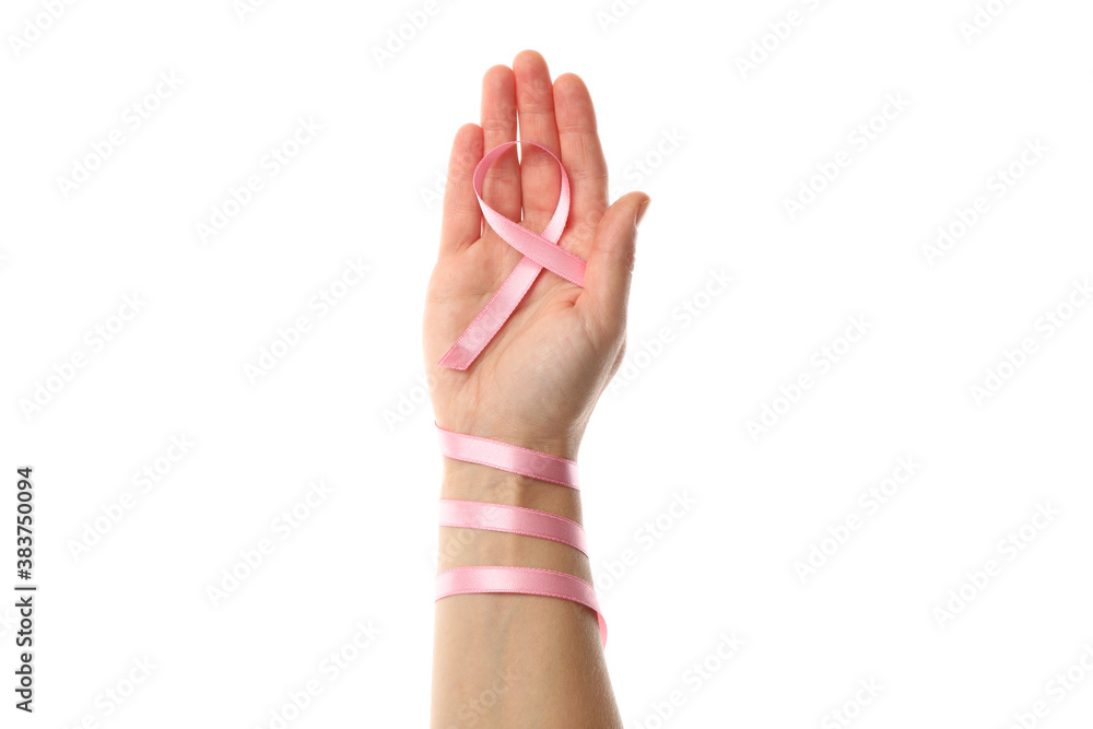 Female hand with pink awareness ribbon isolated on white background Female hand with pink awareness ribbon isolated on white background