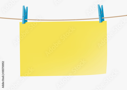 Yellow paper sticky note hanging on a rope