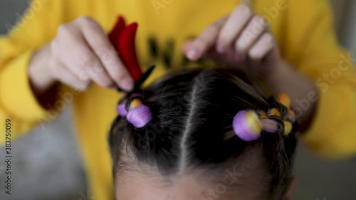 Preparing girls for Halloween at home.