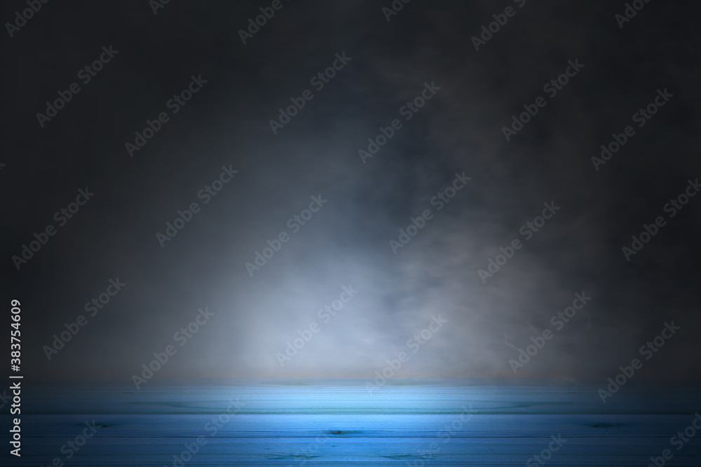 Empty blue wooden table with smoke float up on dark background, perspective wooden floor shelf table, used as a studio background wall to display your products. Empty blue wooden table with smoke float up on dark background, perspective wooden floor shelf table, used as a studio background wall to display your products.