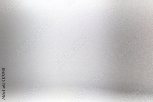 Glowing gray silver paper wall with copy space, abstract texture