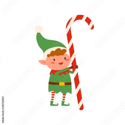 Funny tiny elf in green costume holding huge Christmas candy cane vector flat illustration. Cute Santa helper holding colorful Xmas candy isolated. Smiling childish character with holiday sweet