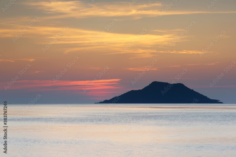 Mountain landscape with sea at sunset