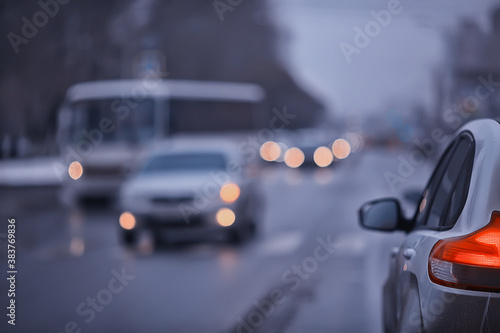 autumn traffic in the city, cars, view from the cab to the track gloomy autumn day © kichigin19