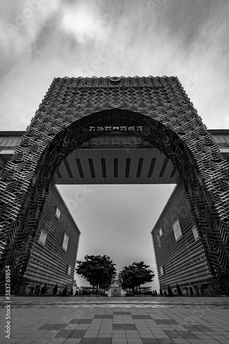 a black and white photo of a big metal archways