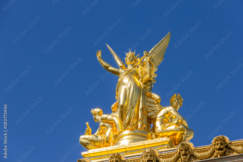 Golden statue in the Opera Garnier, Paris, France