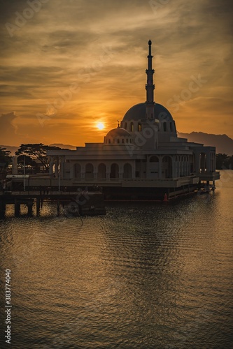 The floating mosque of Kuching and The Darul Hana Bridge during sunset