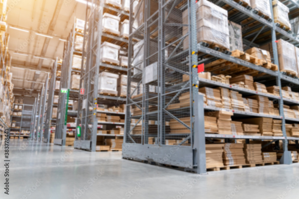 blurred background picture of  Rows of shelves with goods boxes in modern industry warehouse store at factory warehouse storage for logistic
