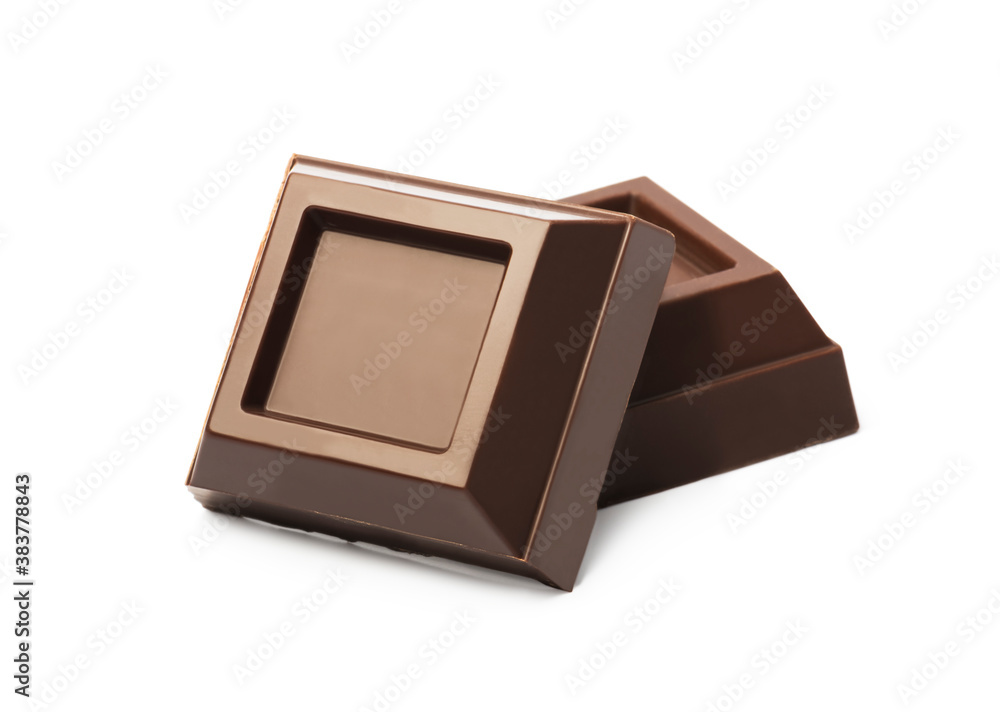 Dark chocolate pieces isolated on white background Dark chocolate pieces isolated on white background