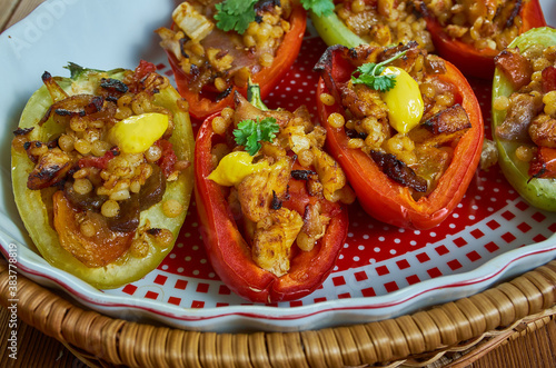 Stuffed red bell peppers with ptitim