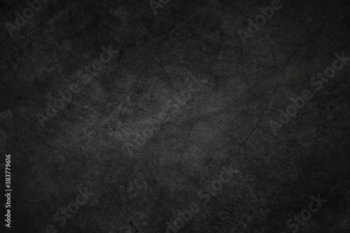 Blur black abstract background. Black concrete texture wallpaper for text and photo. Dark tone wall.
