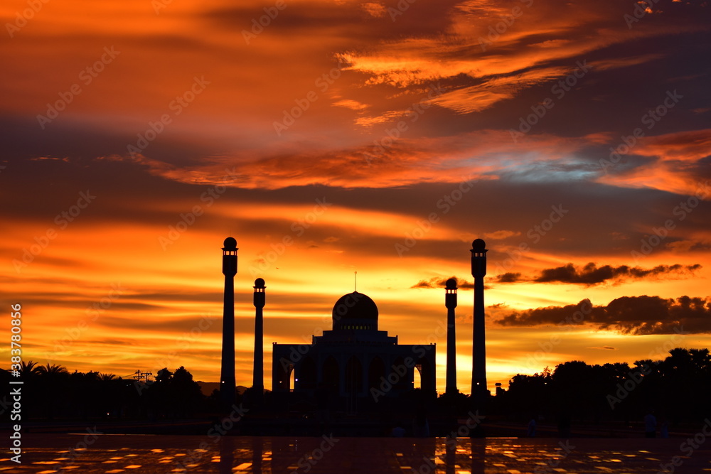 Sunset view with beautiful golden sky At Masjid in the middle of Songkhla Province, the colorful sky lights in the evening