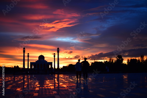 Sunset view with beautiful golden sky At Masjid in the middle of Songkhla Province, the colorful sky lights in the evening 