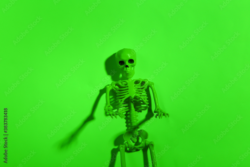 Scary skeleton in green neon light Scary skeleton in green neon light