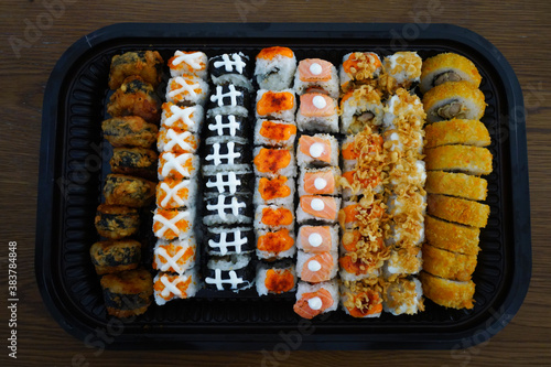 various of sushi roll are ready to be served                               
