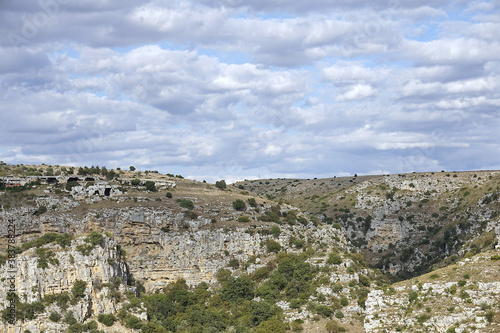 matera, a city to visit, admire, discover. a typical glimpse of the matera landscape - gravina canyon 