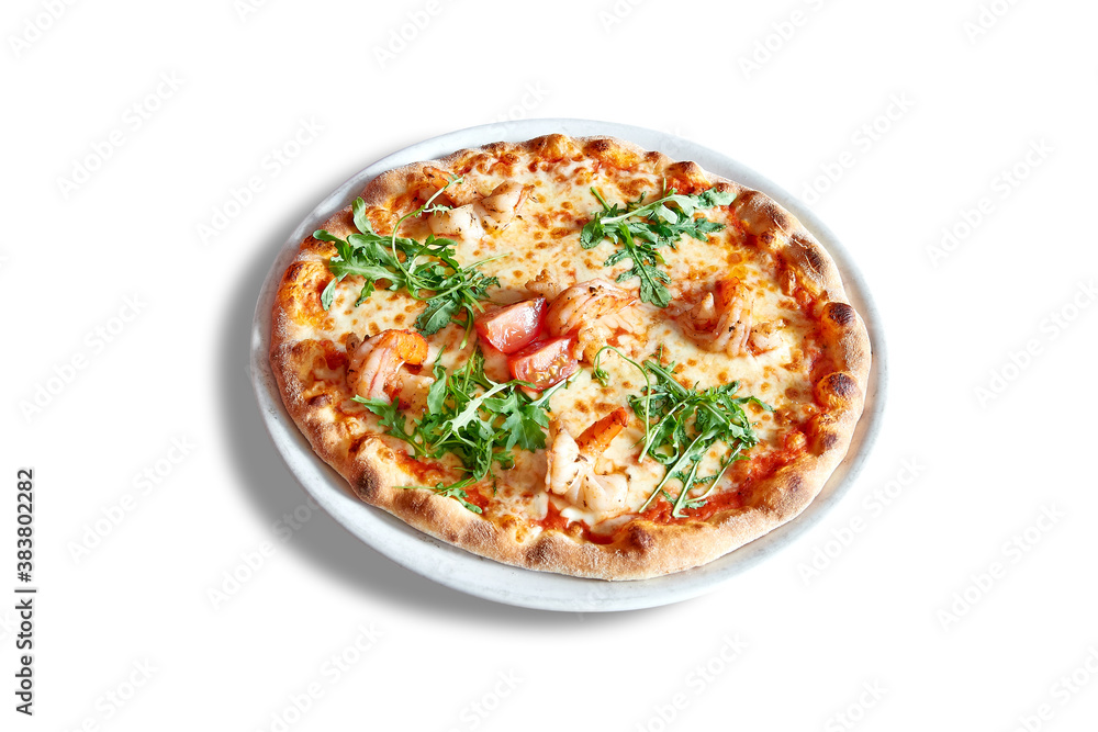 White plate with round pizza and shrimp.