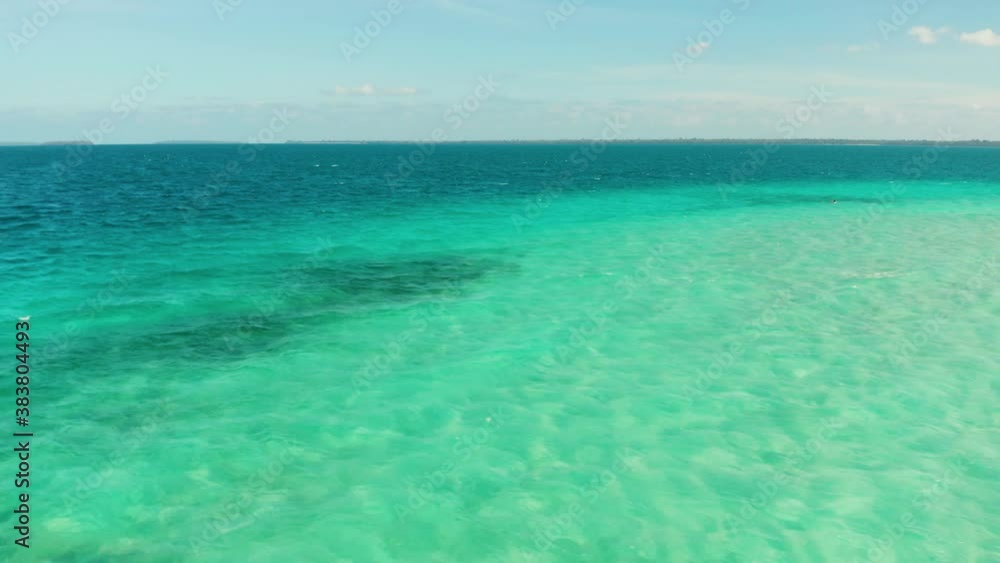 Sea water surface in lagoon copy space for text. Top view transparent turquoise ocean water surface. background texture Sea water surface in lagoon copy space for text. Top view transparent turquoise ocean water surface. background texture