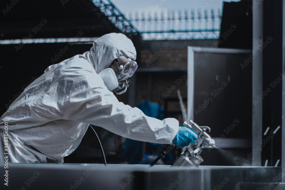 Ταπετσαρία Person in protective coverall suit, goggles, and gas protection mask spray paint