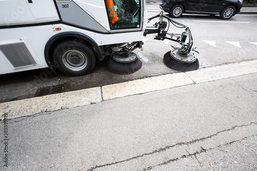 Canvas Print Detail of a street sweeper machine/car cleaning the road