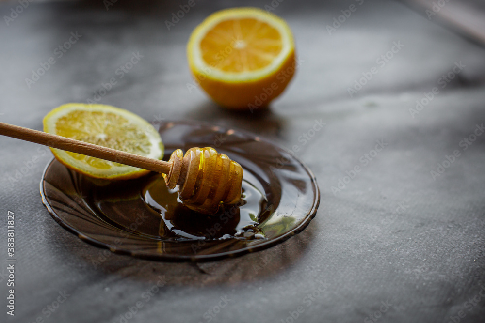 wooden spoon of honey with lemon wooden spoon of honey with lemon