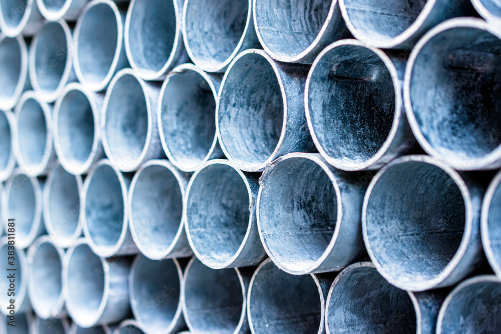 Close up of metal pipes pile. Industrial background. Close up of metal pipes pile. Industrial background.