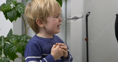 Child Cries Mother Calms Comforting Soothing Consoling Crying Son. Hugs Kisses at Kitchen 4K